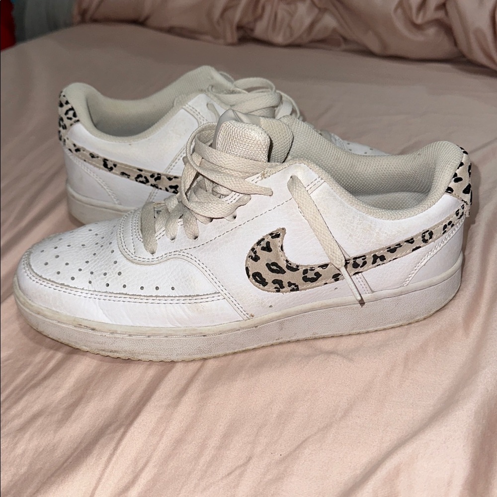 Nike sneakers with cheetah detailing